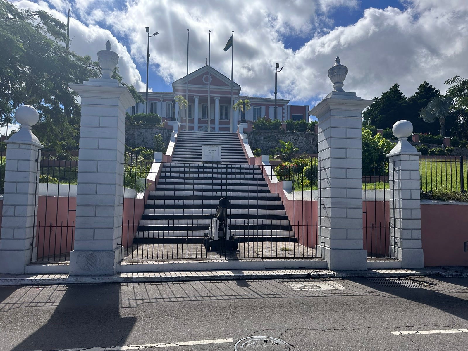 Pink Government House in Nassau with the Columbus statue and ceremonial staircase