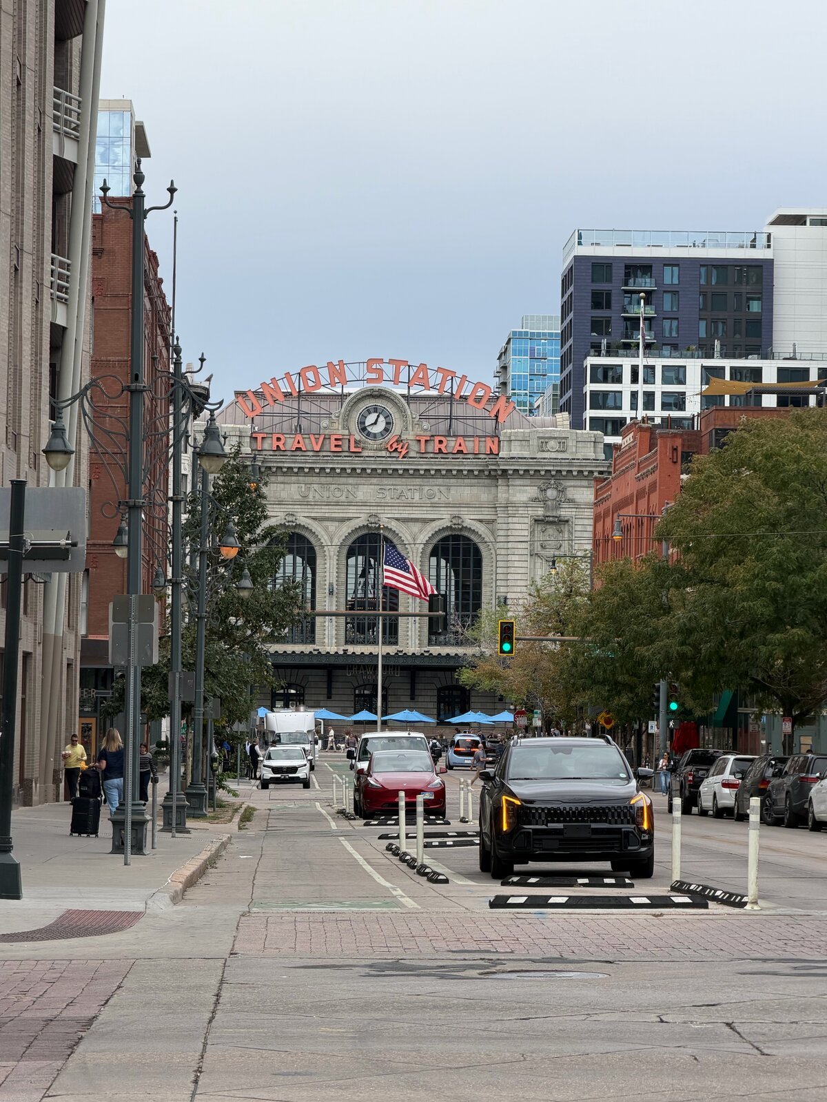 Denver Union Station neon sign and facade from the street