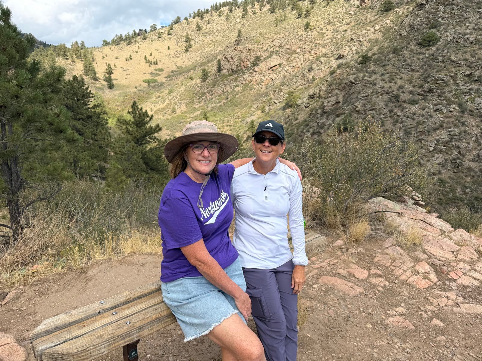 Two friends at a trail overlook