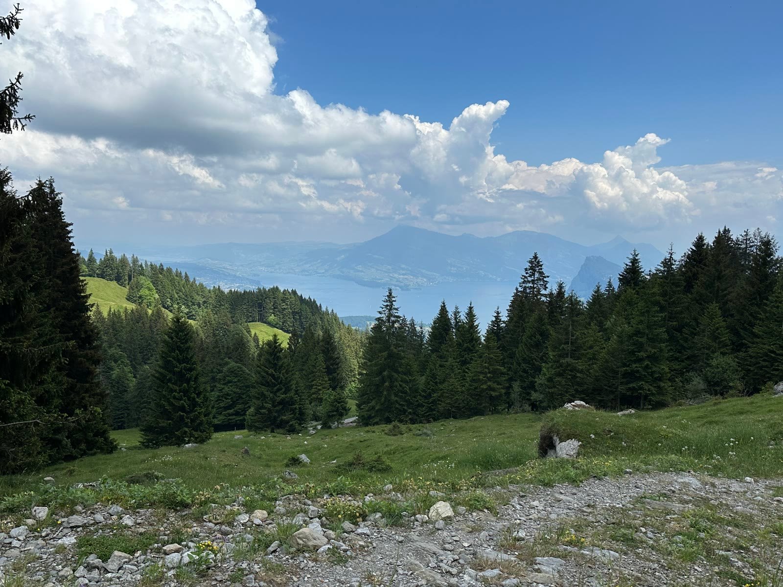 Lake and mountains viewed from a rocky hiking trail