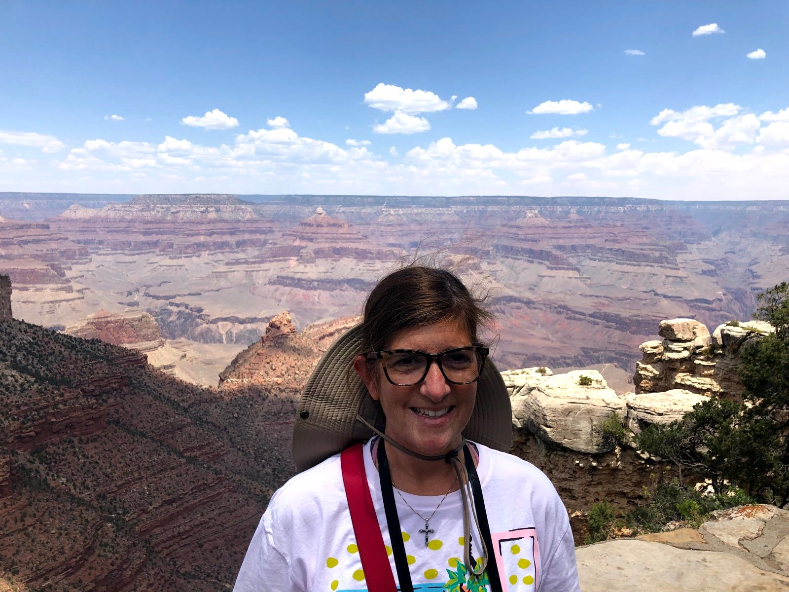 Leslie smiling at a Grand Canyon South Rim overlook