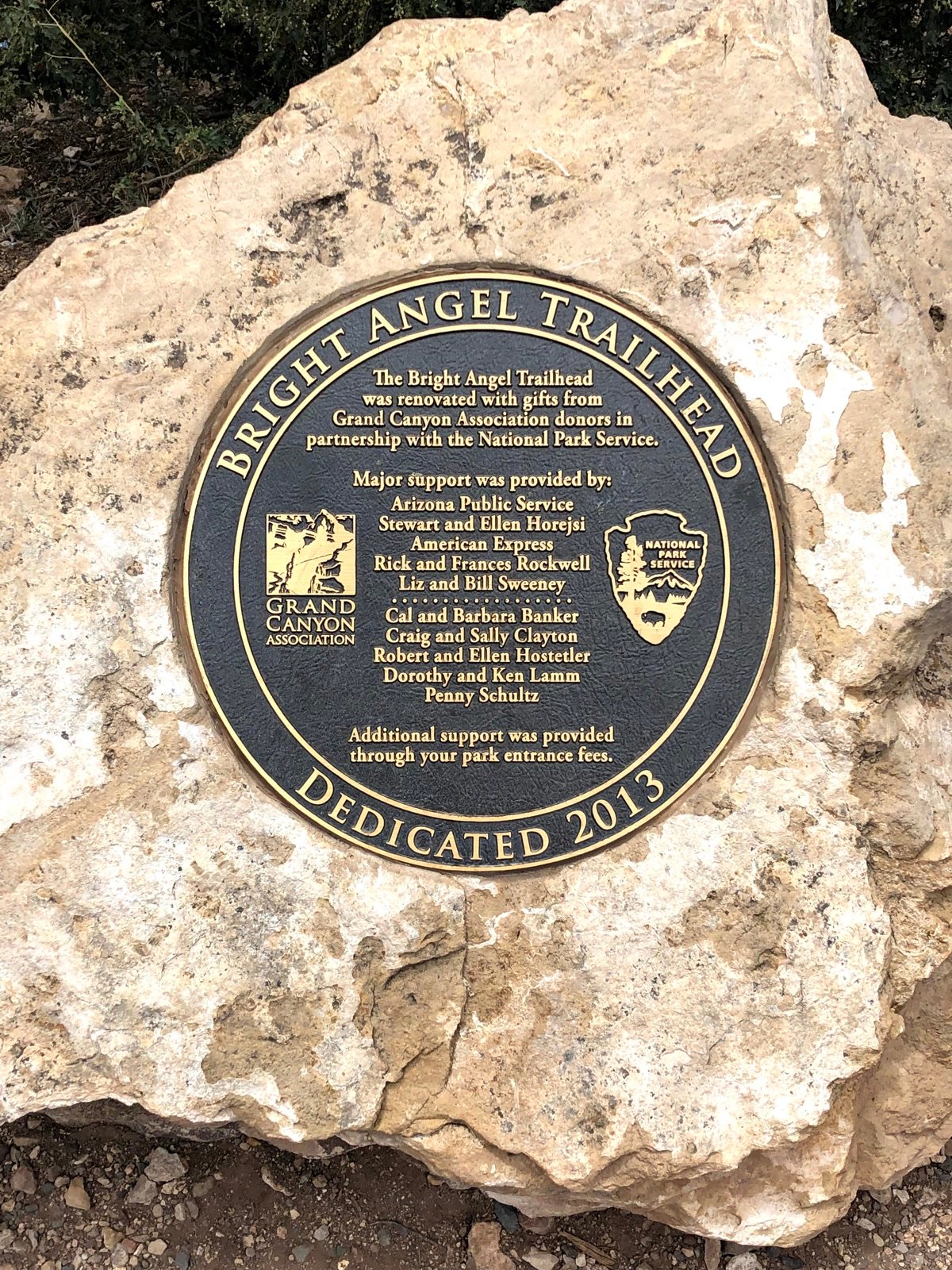 Bronze Bright Angel Trailhead commemorative plaque on the rock