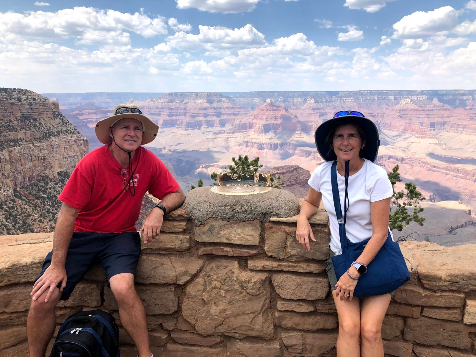 Rick and Tracey Bryant at a Grand Canyon overlook wall