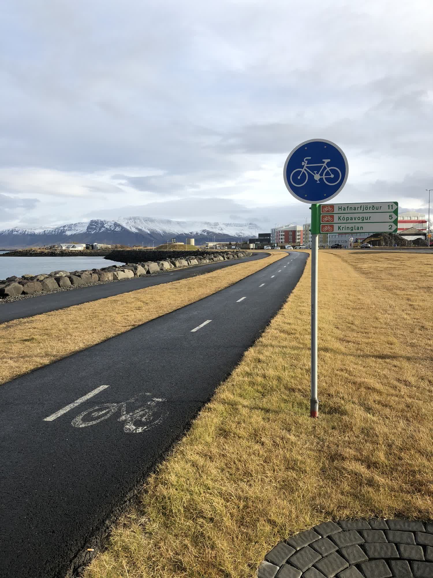 Coastal bike path with mountain view near Reykjavík