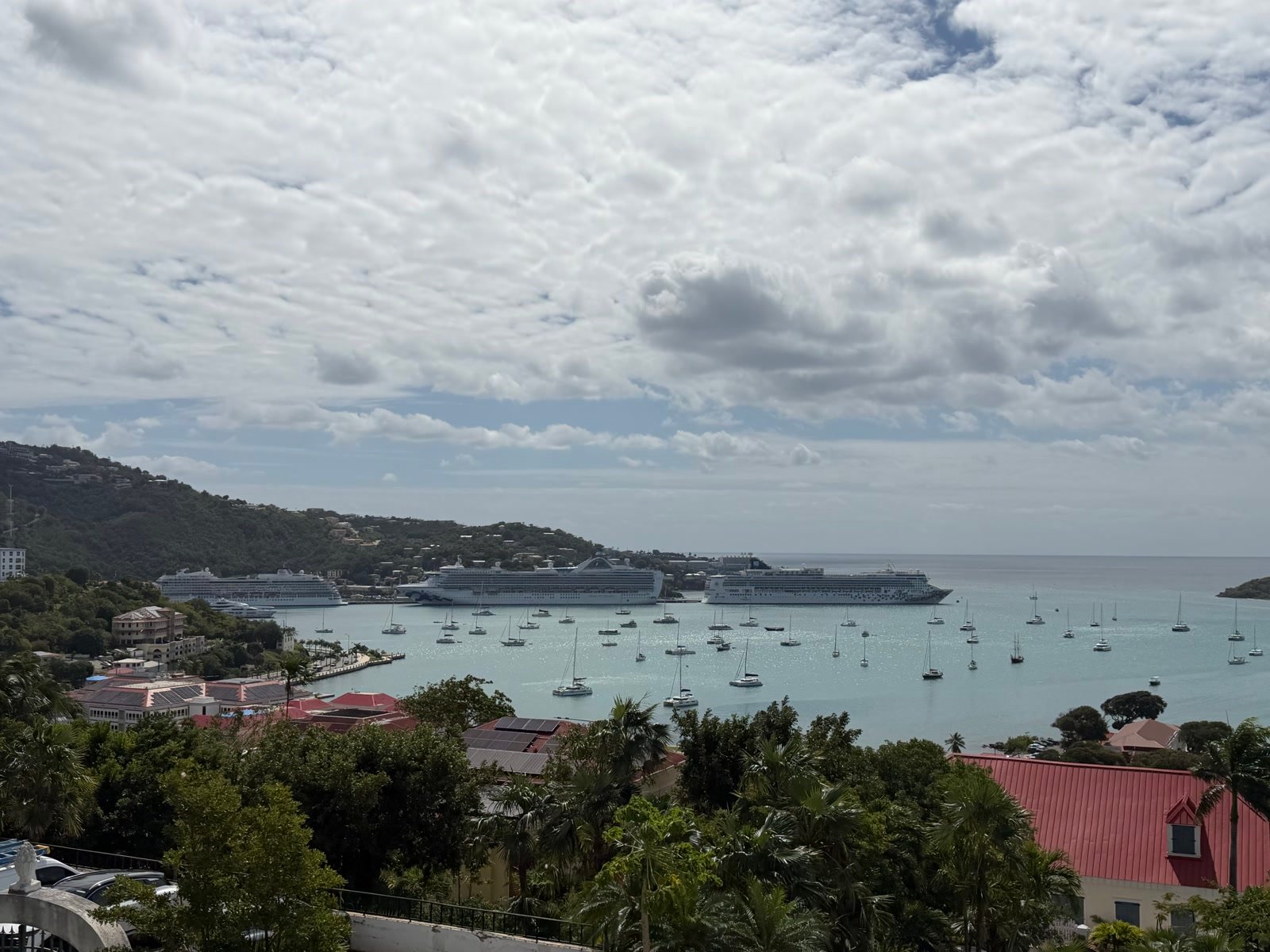 Panorama of Charlotte Amalie harbor with sailboats and cruise ships