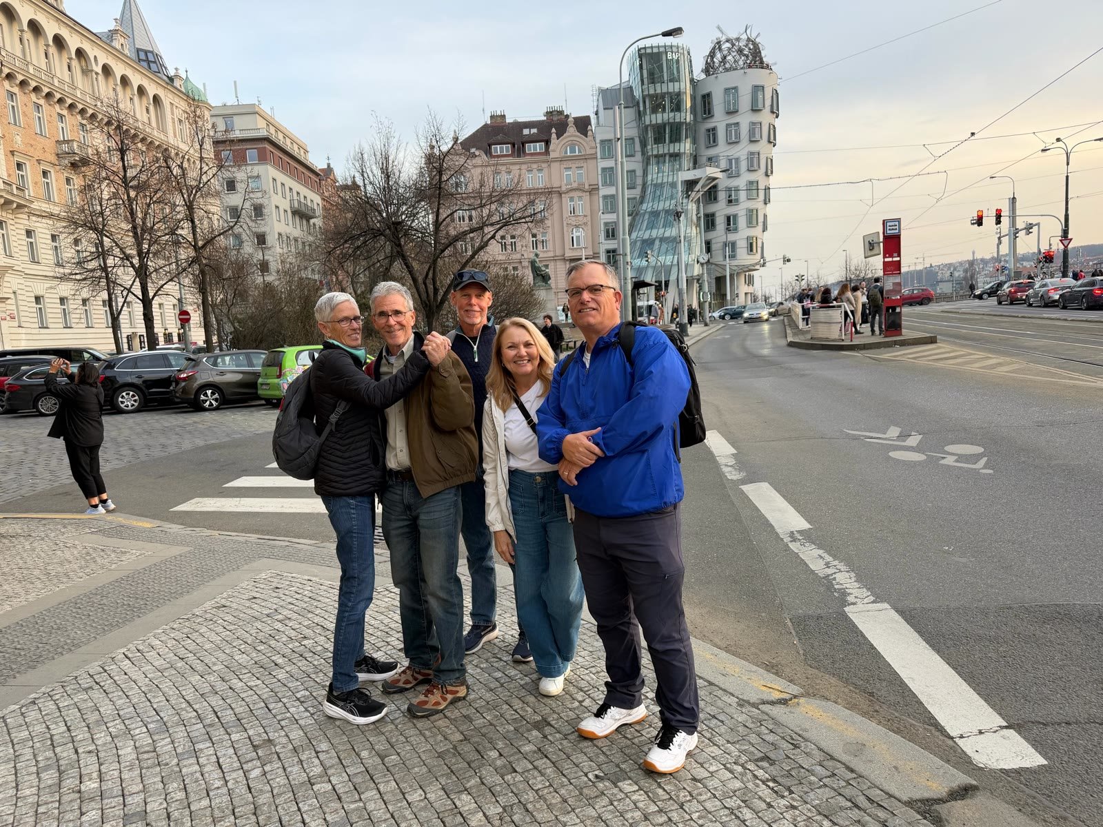 Group photo in front of the Dancing House in Prague