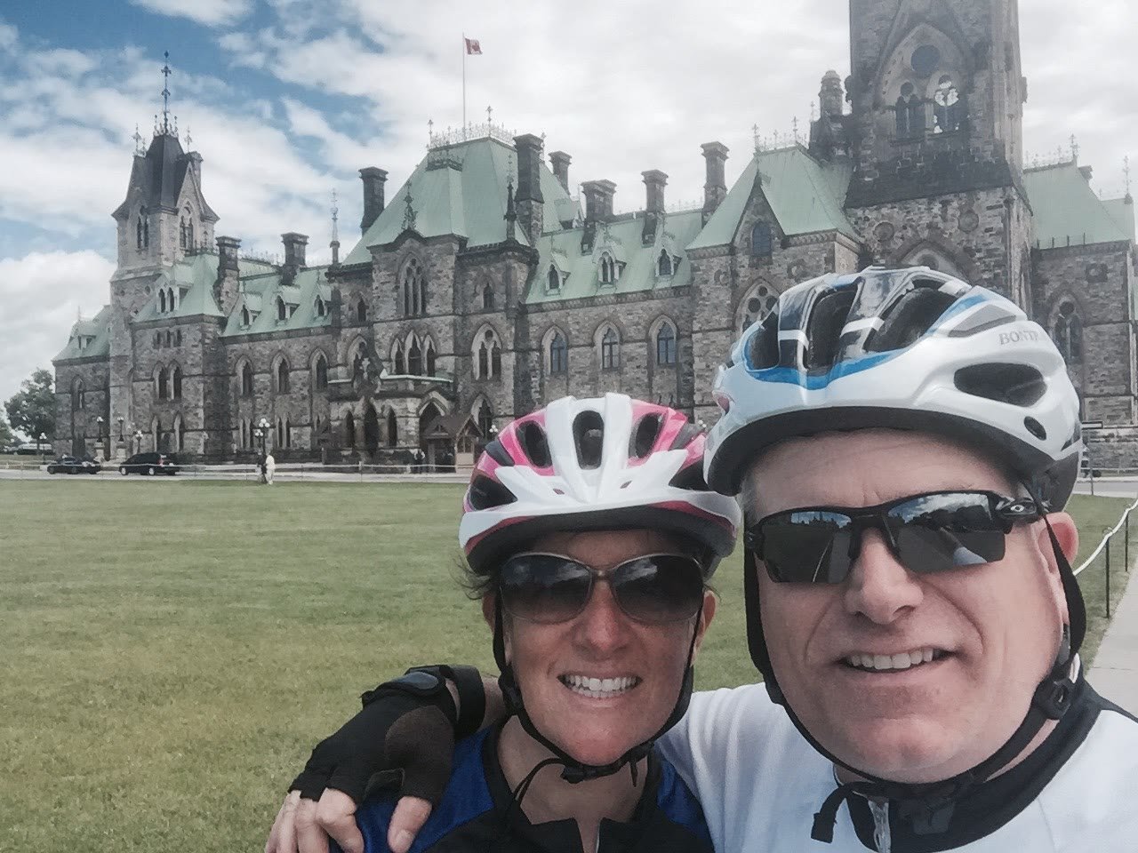 Chuck and Leslie in bike gear at Parliament Hill